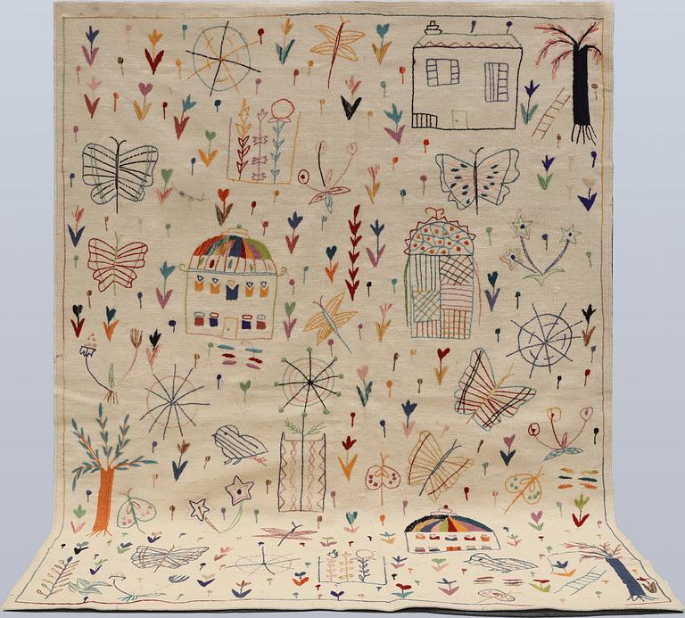 A hand-embroidered Kilim rug, approx. 244 x 180 cm.