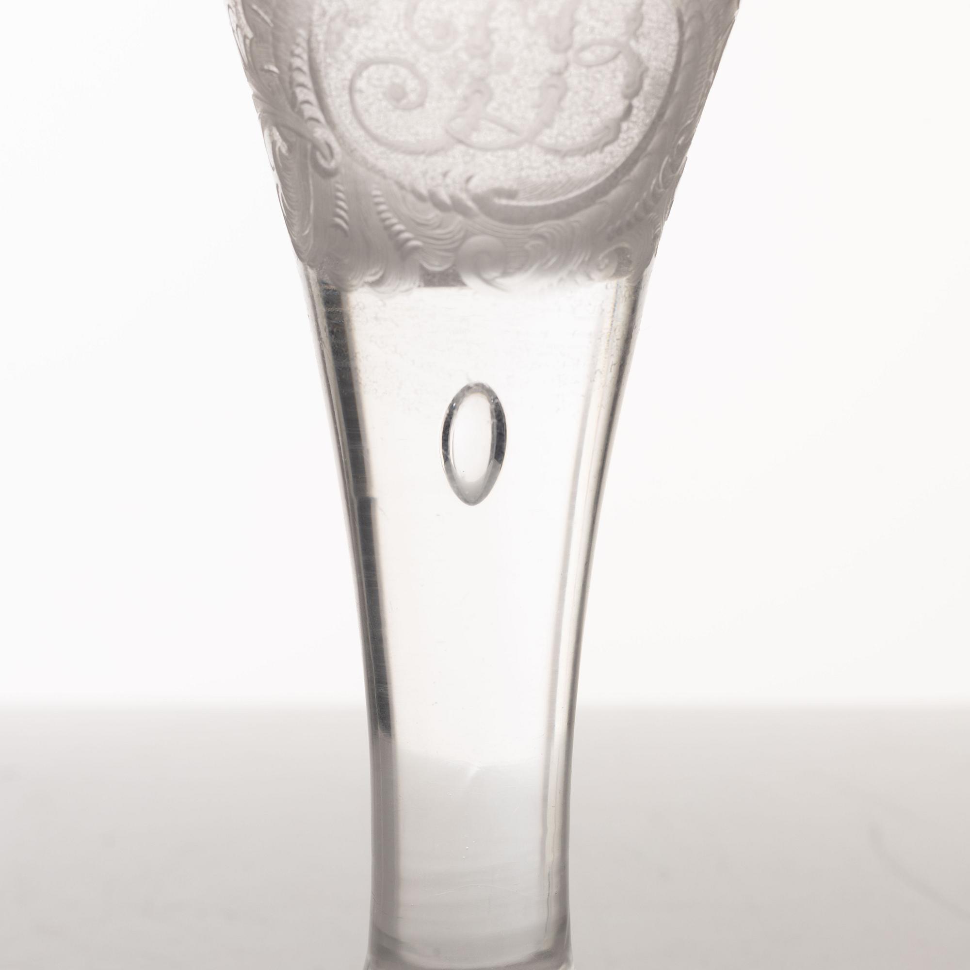 A presumably German engraved and gilt rococo glass, mid 18th century.