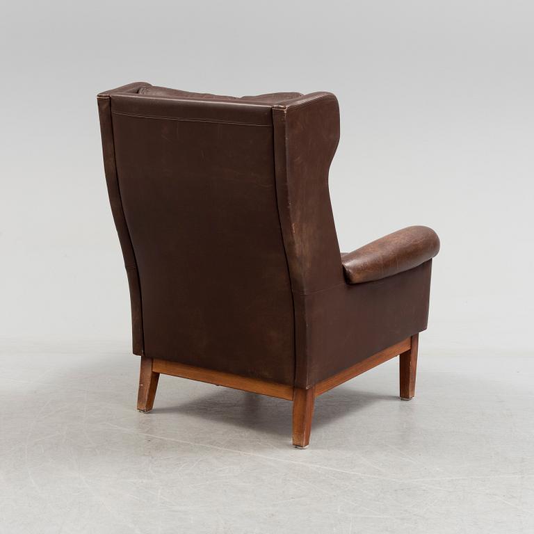 A 20th century leather armchair.