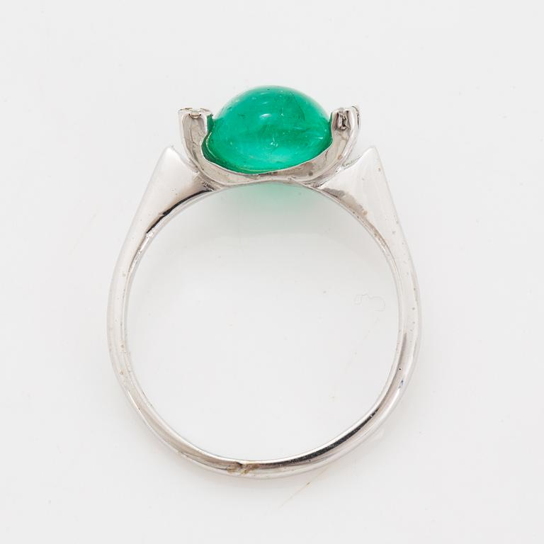 18K white gold cabochon emerald and diamond ring.