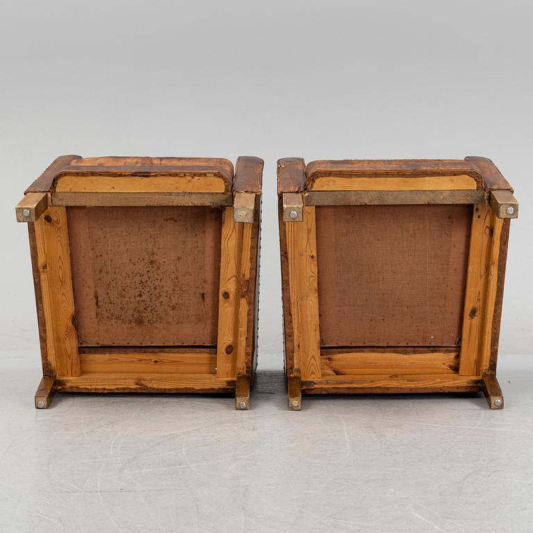 Björn Trädgård, attributed to, a pair of leather lounge chairs from Firma Svenskt Tenn, mid 20th Century.