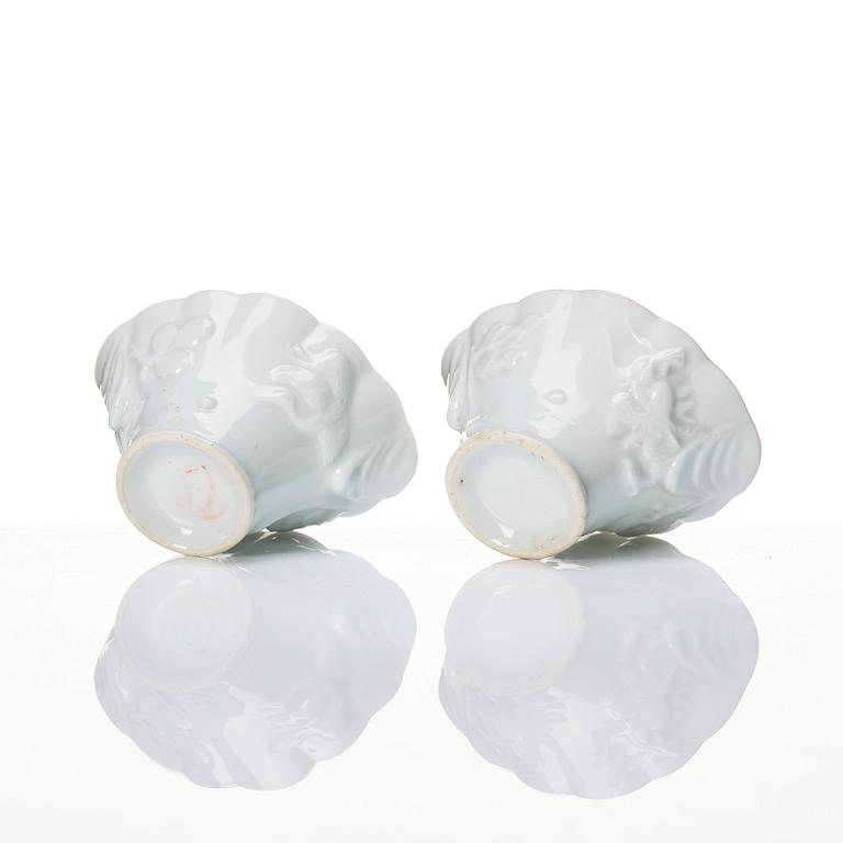 A pair of blanc de chine libation cups, Qing dynasty, 19th Century.