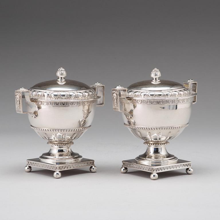 A pair of Swedish late 18th century silver sugar bowls and covers, mark of Pehr Zethelius, Stockholm 1780 and 1781.