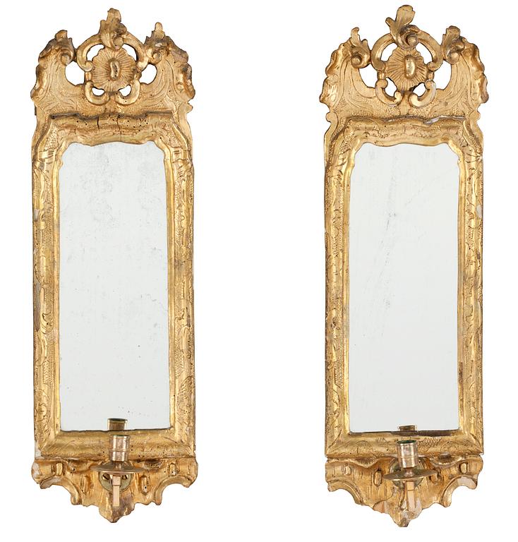 A pair of Italien 18th/19th Century one-light girandole mirrors.