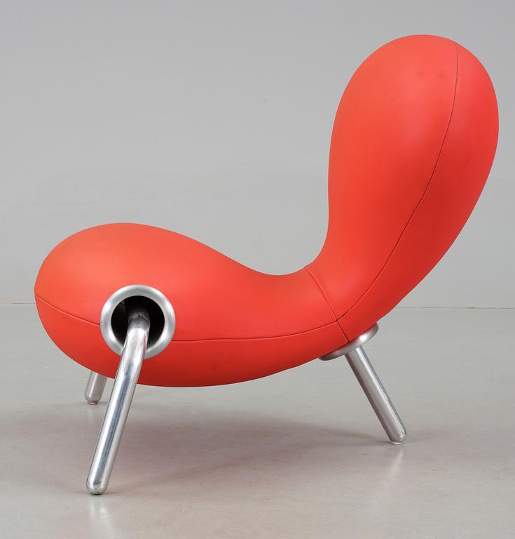 A Marc Newson coral red neoprene 'Embryo Chair,