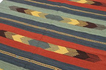 A kilim rug, c 242 x 181 cm.