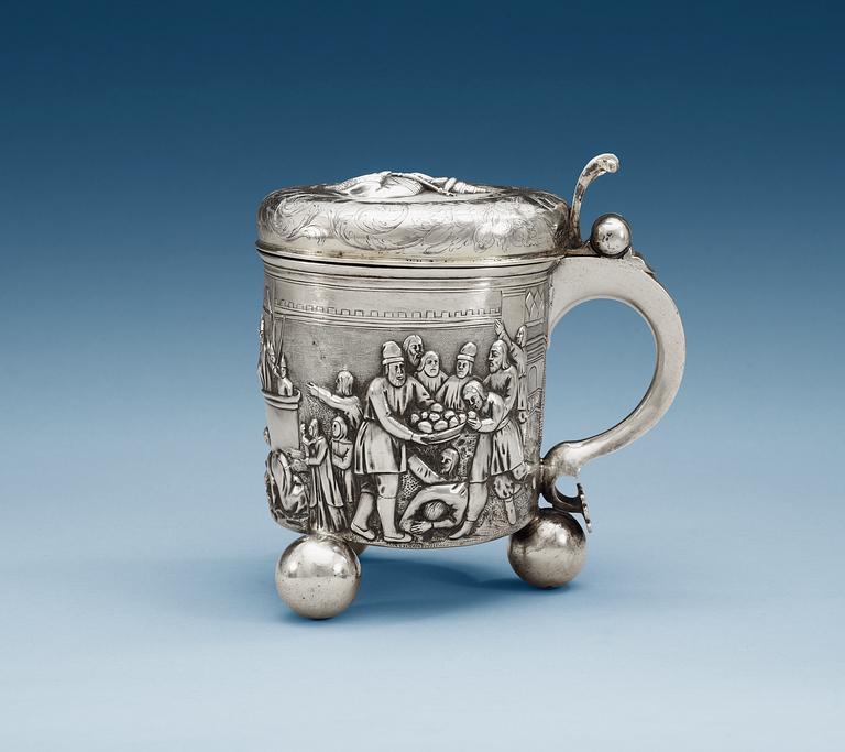 A German 18th century parcel-gilt tankard, makers mark of Batholome Wilckens, Hamburg ca 1700. Russian motif.