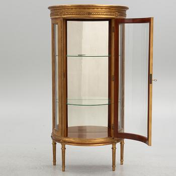 A Louis XVI-style display cabinet, circa 1900.