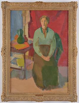 Karl Isakson, Seated woman in a green blouse.