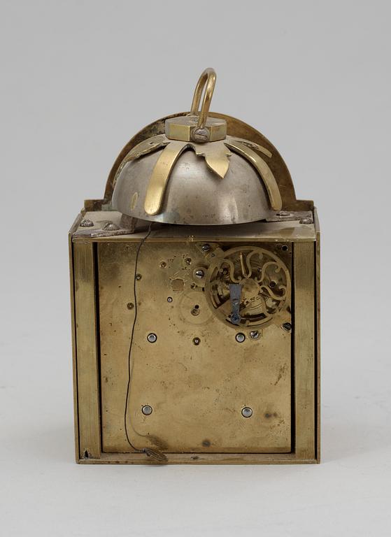 An English 18th century brass table clock by Robert Markham, London.
