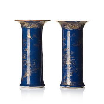 1237. A pair of powder blue and gold 'trumpet' vases, Qing dynasty, 18th century.