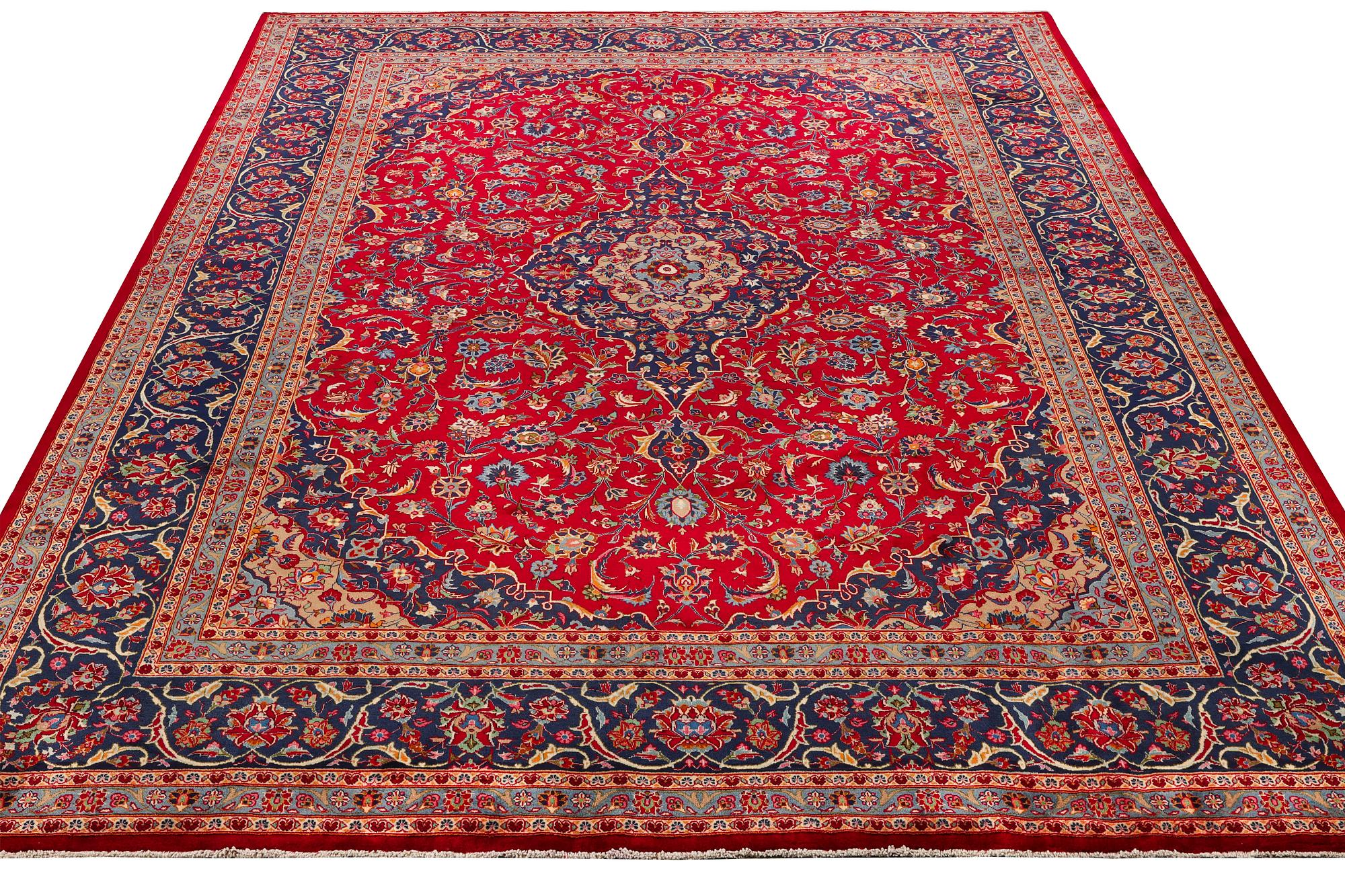 A Keshan carpet, c. 408 x 295 cm.
