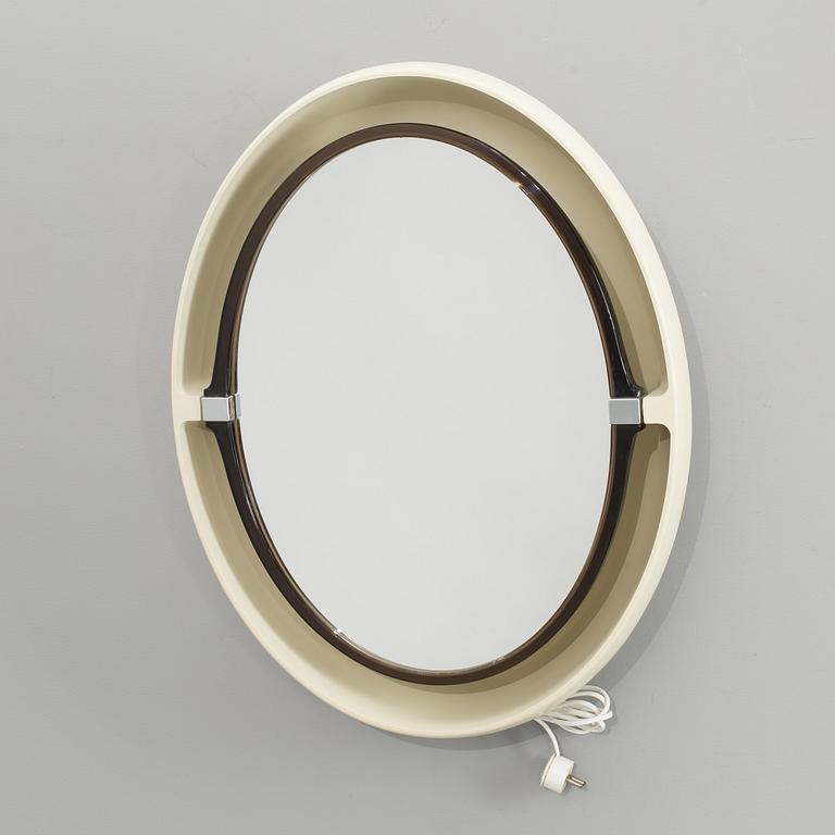 A "SPACE AGE" WALL MIRROR WITH LIGHT BY ALLIBERT, 1970´s.