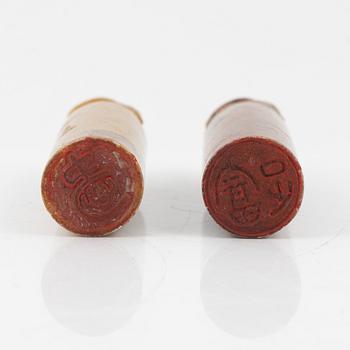 A set of four stone scholars objects and a enameled silver box with cover, Qing dynasty, circa 1900.