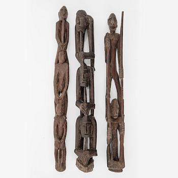 Three wooden Asmat scultpures, Indonesia, Jakarta, 20th Century.