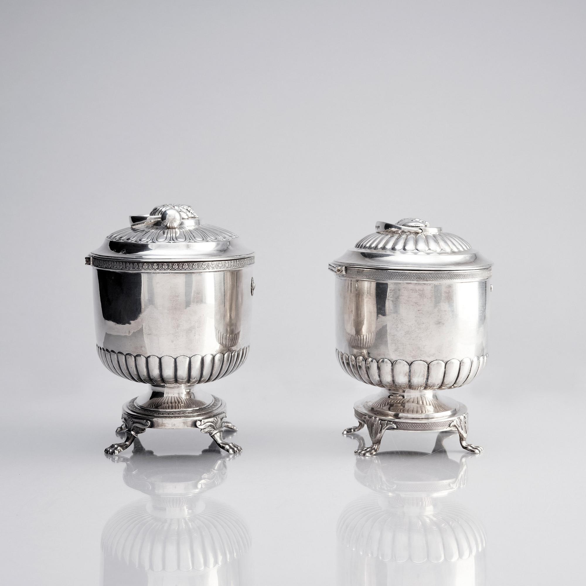 Skrin, silver, två snarlika, stor: Anders Lundqvist, Stockholm 1828, mindre: Johan Fredrik Björnstedt, Stockholm 1824.