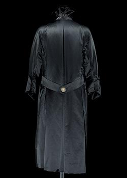 A 1950s/60s black silk coat by Christian Dior.