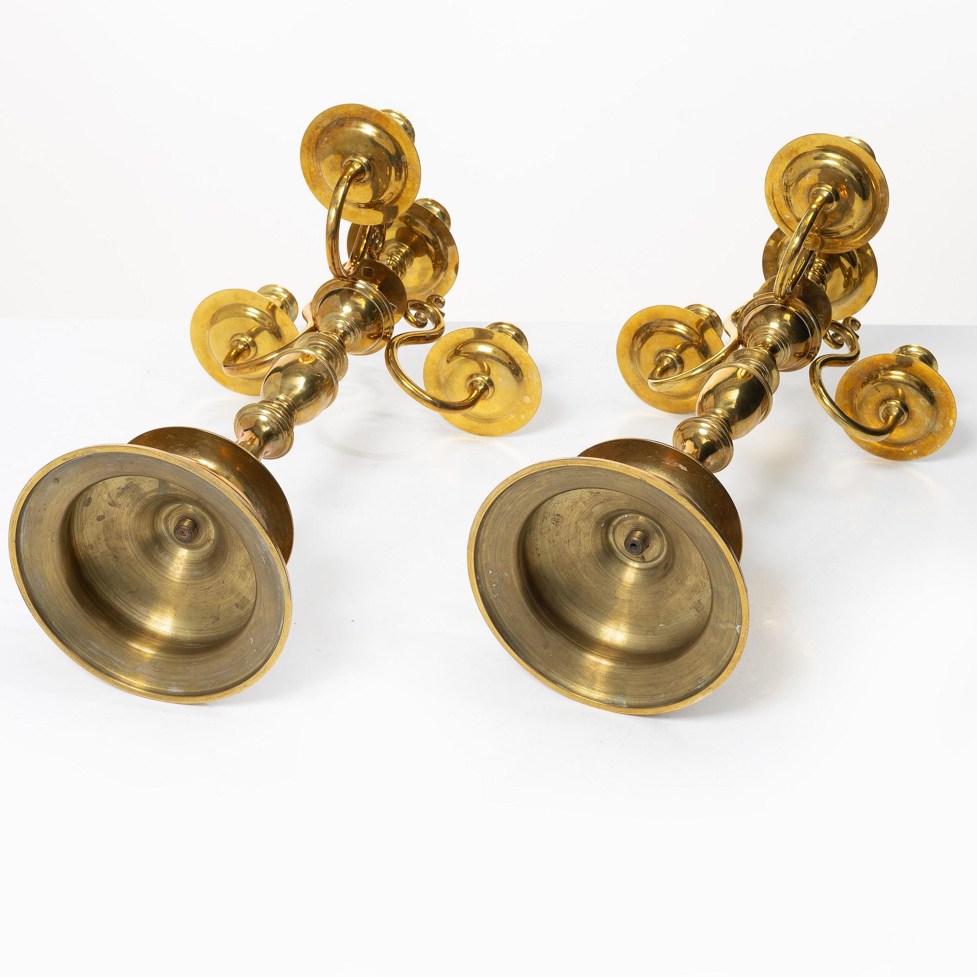 A pair of brass candelabras, Gusums Bruk, Sweden, around 1900.