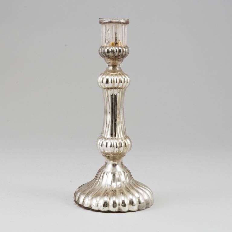 A 19th century glass candlestick.