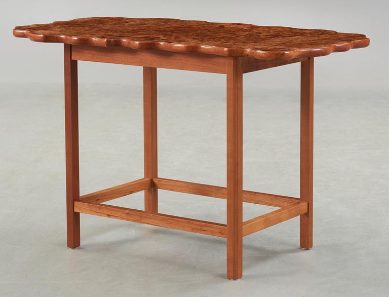 A Josef Frank cherry and burrwood table, Svenskt Tenn, model 1058.