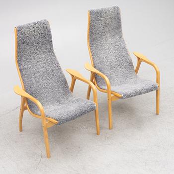 Yngve Ekström, a pair of "Lamino" armchairs for Swedese.