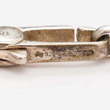 Gucci, A pair of earrings, bracelet, ring and necklace made of sterling silver. Marked Gucci, Made in Italy.