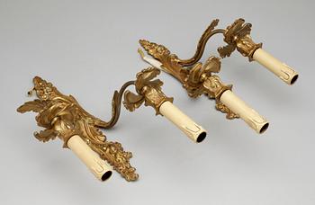 APPLIQUER, ett par, rokokostil, 1900-talets mitt.