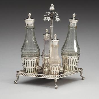 BORDSURTOUT, silver, för fyra flaskor, gustaviansk, Johan Wilhelm Zimmerman, Stockholm 1799. Vikt 750 gram.