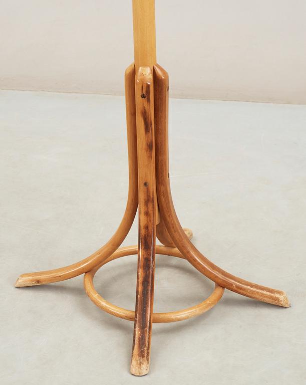 TAMBURMAJOR / KLÄDHÄNGARE, 1900-tal.