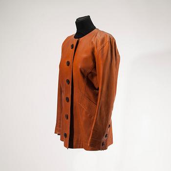 JACKA, Yves Saint Laurent.