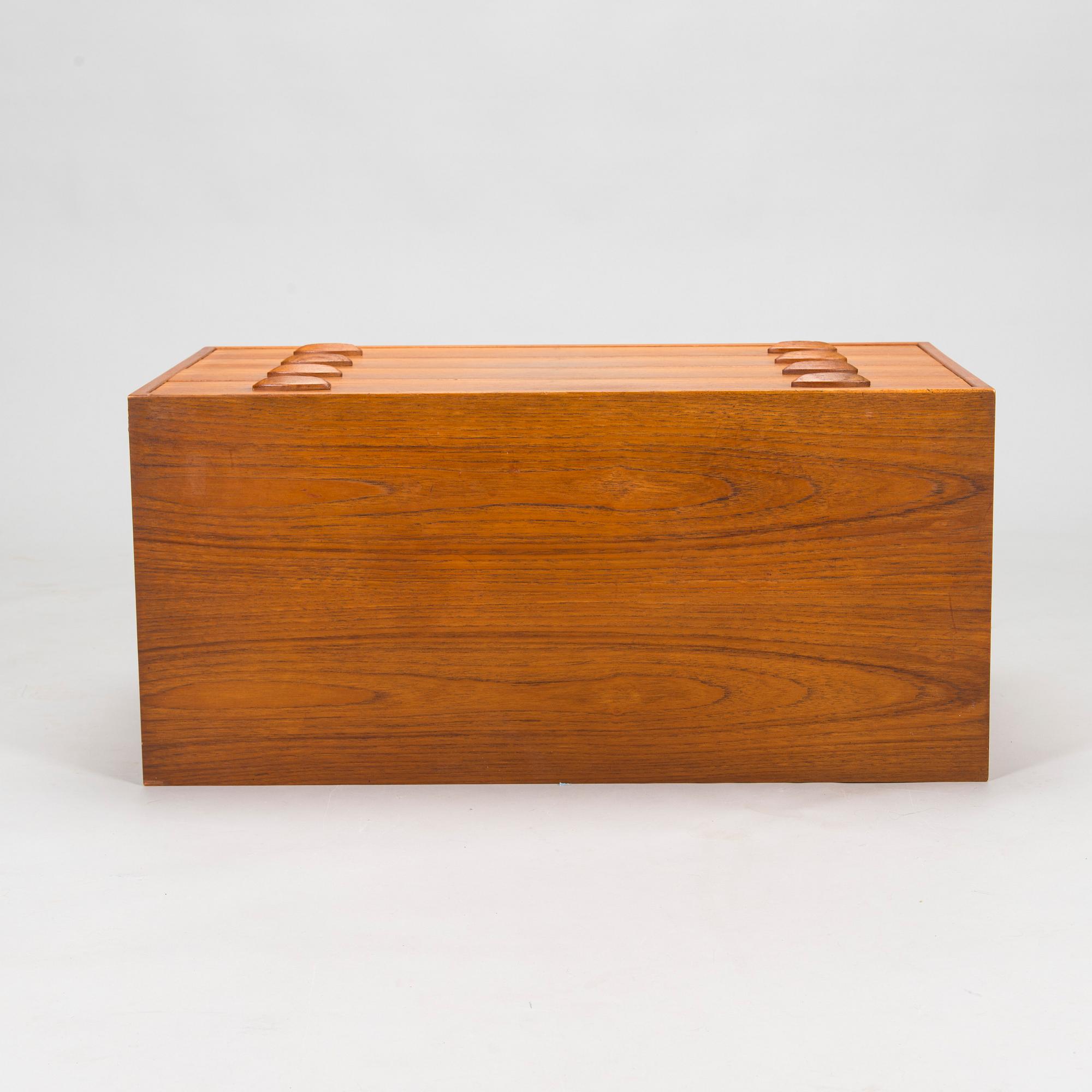 Kai Kristiansen, a teak veneered chest of drawers, FM mobler, Denmark, mid 20th century.