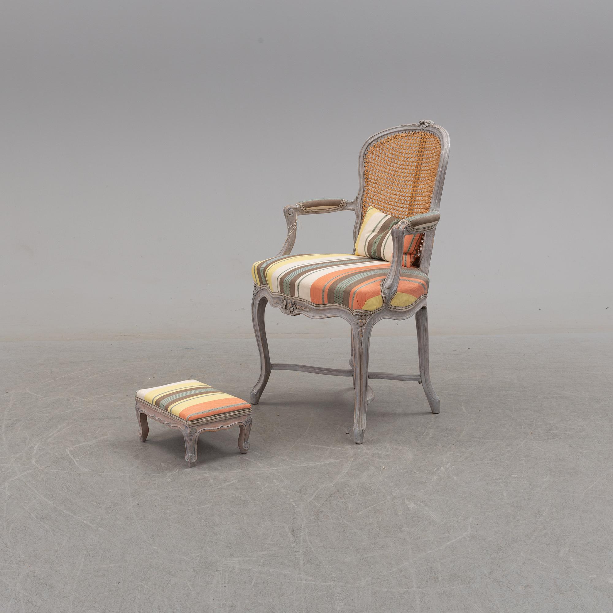 A later part of the 19th century rococo style armchair and second half of the 20th century stool.