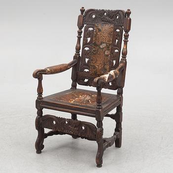 A Baroque style armchair, late 19th century.