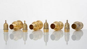 Four English 18th century silver-gilt caster-cruet, one pair marked Thomas Shepherd, 1790, one John Delmester 1760,