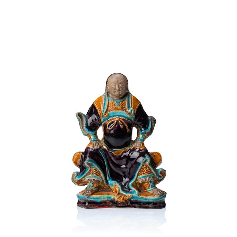 A pottery figure of a the warrior god Guandi, Ming dynasty (1368-1644).