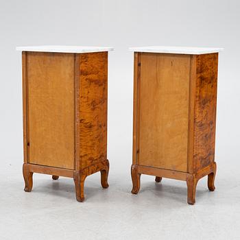 A pair of bedside tables, early 20th century.