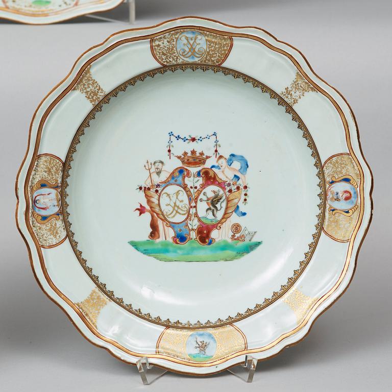 A famille rose part armorial dinner service, Qing dynasty, Qianlong (1736-95). (12 pieces).