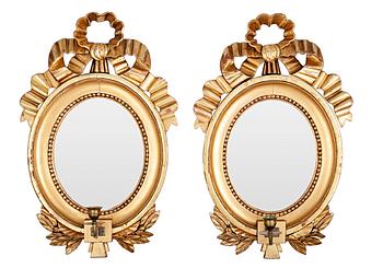 A PAIR OF ONE-CANDLE MIRRORS.