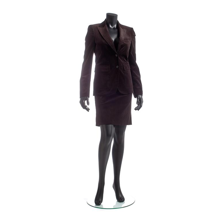 GUCCI, a two-piece suit consisting of jacket and skirt.