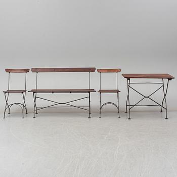 A garden sofa, table and a pair of chairs, first half of the 20th century.
