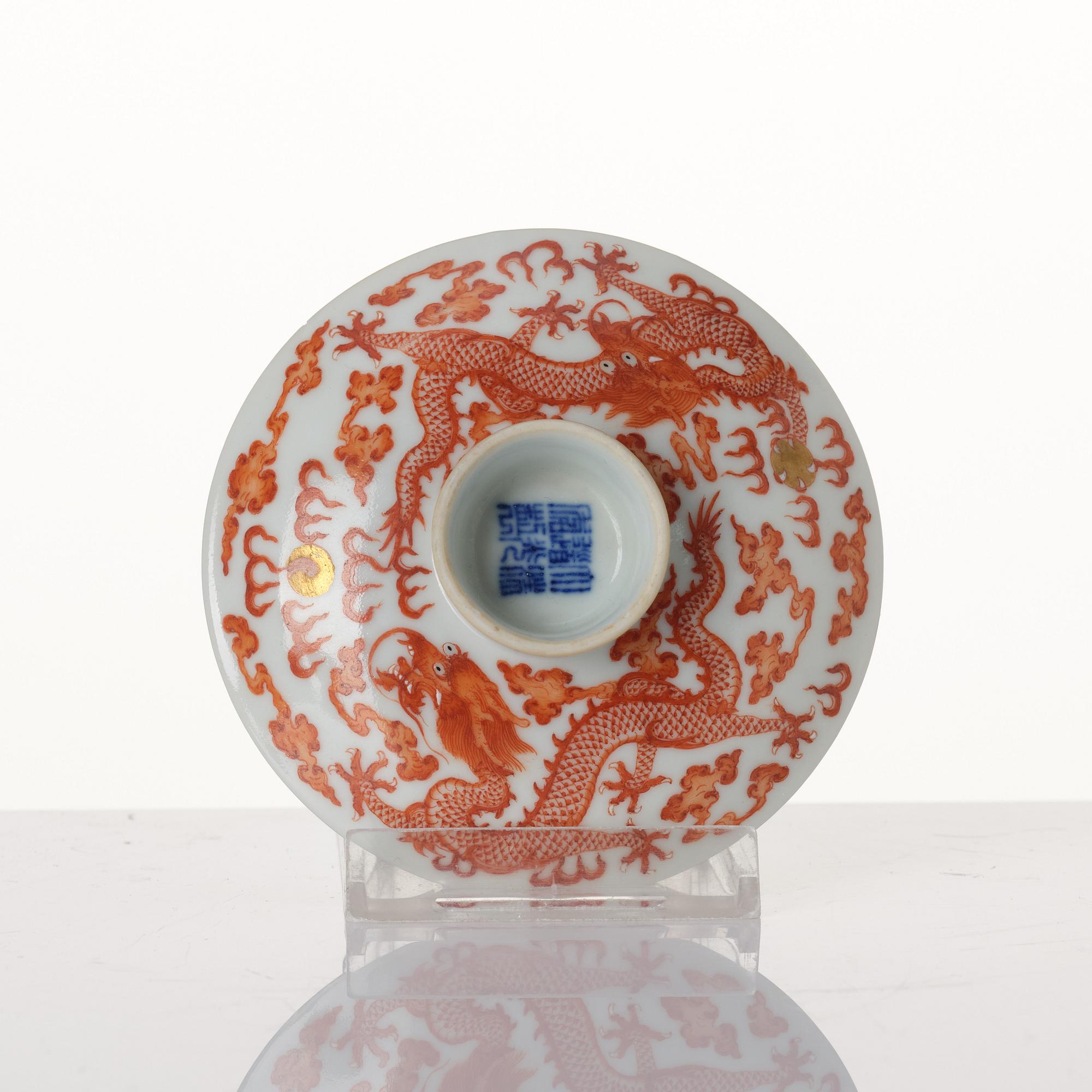 A pair of five clawed dragon bowls on stands and a cover, Qing dynasty, Daoguang mark and period (1821-50).