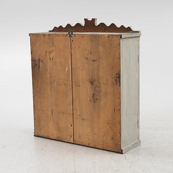 A wall cabinet, 19th Century.