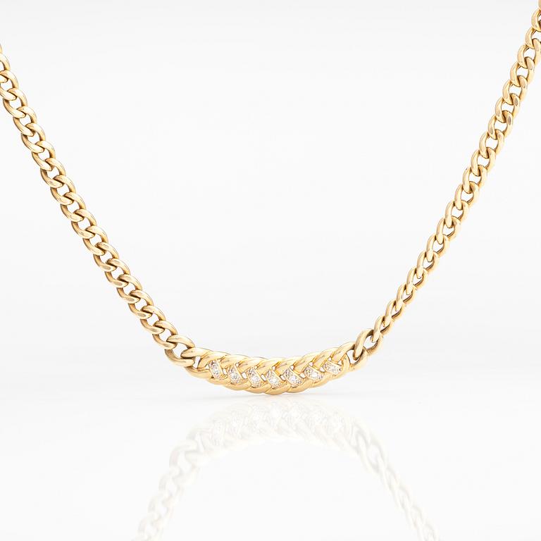 A 14K gold necklace with diamonds ca 0.035 ct in total.
