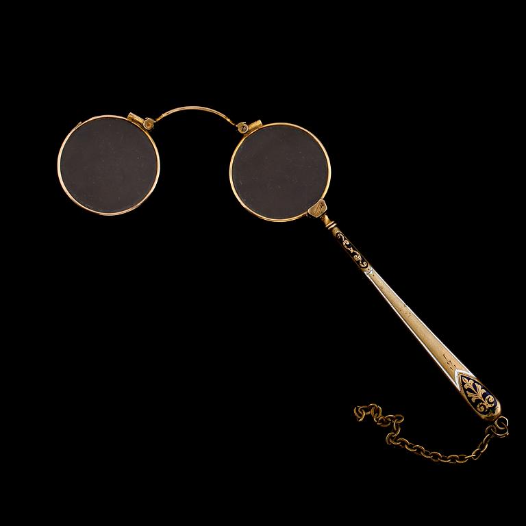 LORGNETTE, Gulmetall och 14 k guld, omkring år 1900. Total vikt ca 24 gram.