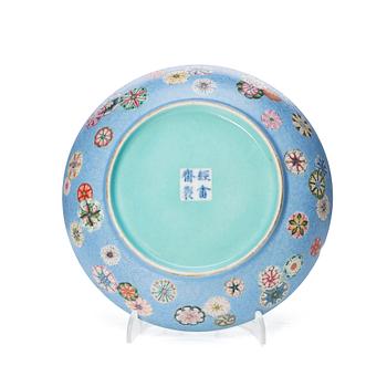 1283. A famille rose sgraffiato 'flower brocade' dish, Qing dynasty.