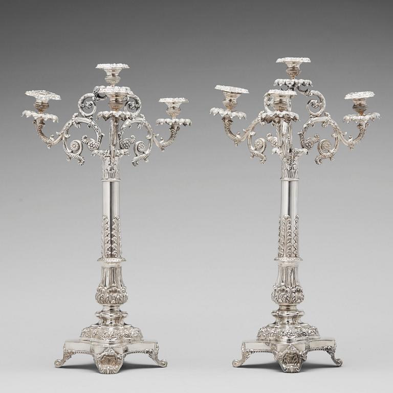 A pair of Swedish Empire silver candelabra, mark of Gustaf Mollenborg, Stockholm 1838.