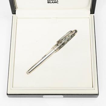 A Montblanc rollerball pen, limited edition 'Soulmakers for 100 years', 'Starwalker'.