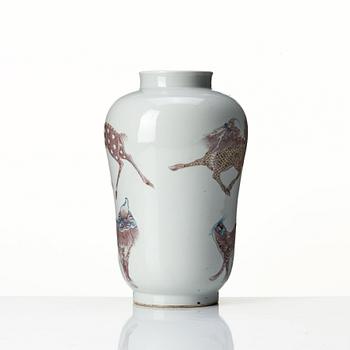 A iron red decorated vase, late Qing dynasty with seal mark to base.