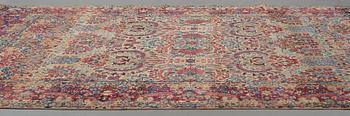 A carpet, a semi-antique Kerman, ca 375-379,5 x 268-271 cm.
