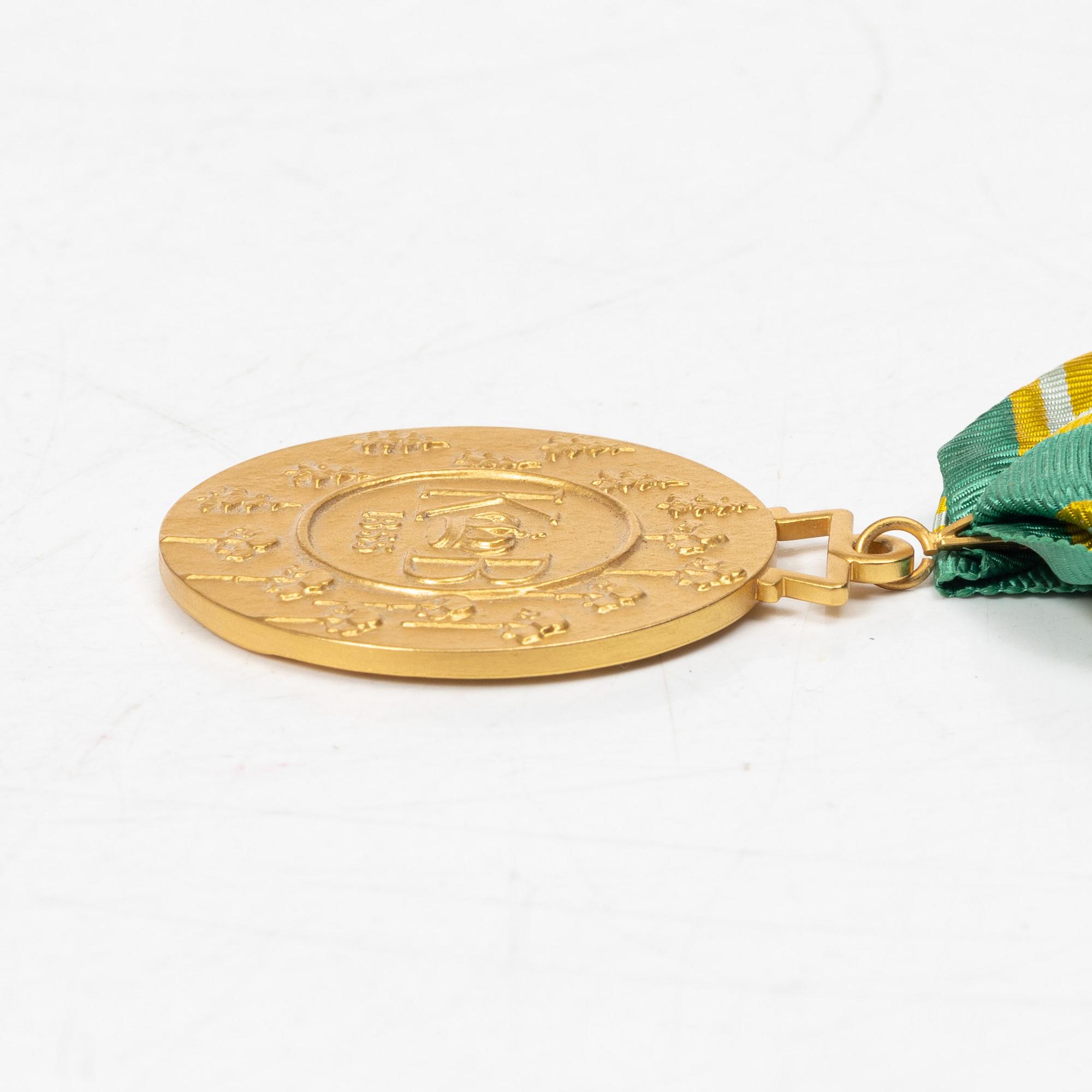 An 18K gold medal, Sporrong, Stockholm 1958.